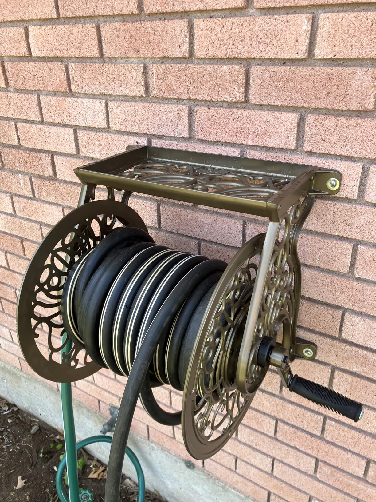 Liberty GARDEN 704 Decorative Cast Aluminum Wall Mount Garden Hose Reel, Holds 125-Feet of 5/8-Inch Hose - Bronze Customer Review Liberty GARDEN 704 Decorative Cast Aluminum Wall Mount Garden Hose Reel, Holds 125-Feet of 5/8-Inch Hose - Bronze - Customer Photo 1