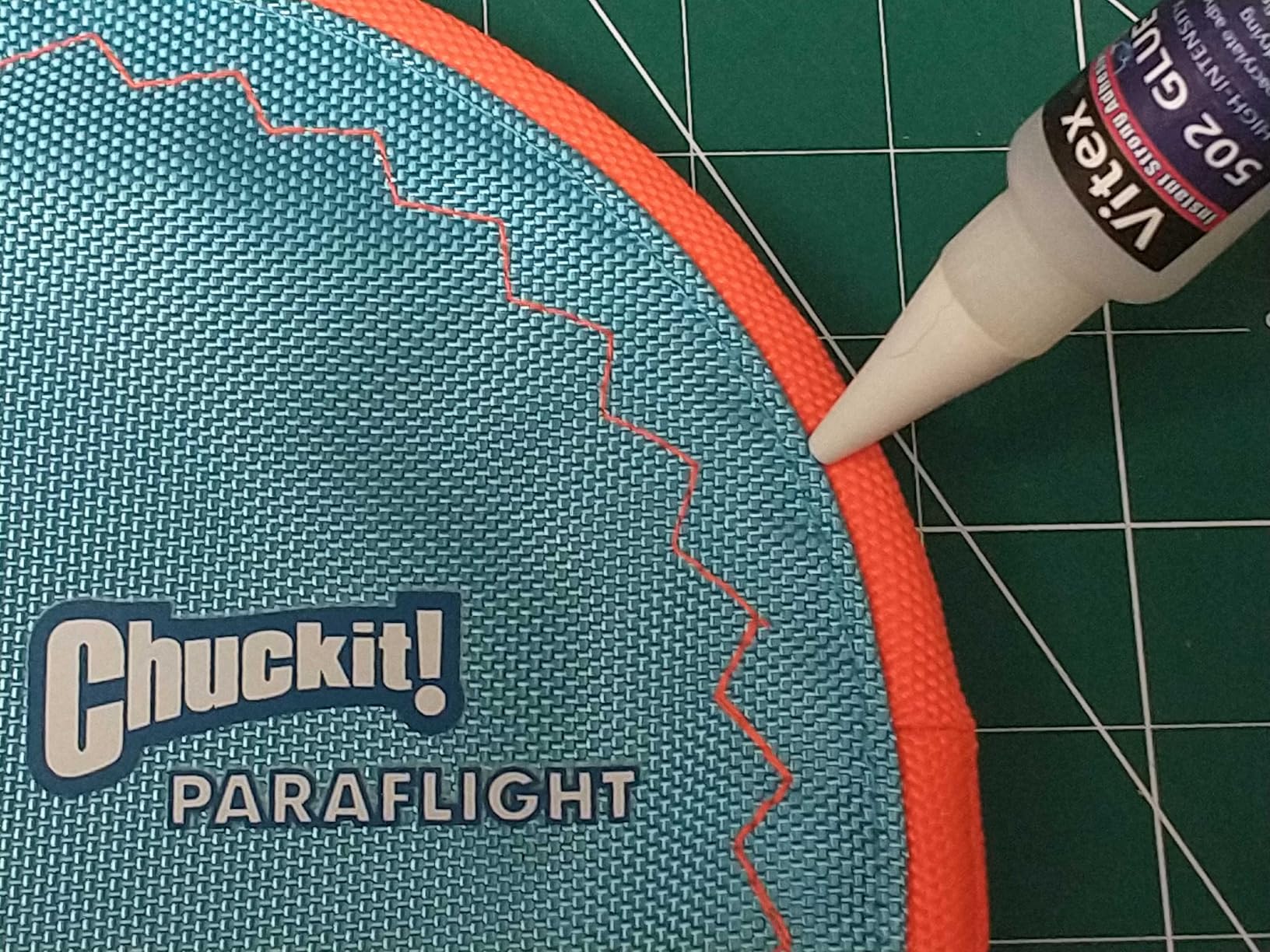 Chuckit! Paraflight Flying Disc Dog Toy - Water Floating Flyer - Durable Nylon Construction with Soft Rubber Edges - For Medium and Large Dogs - Size Large - 9.75