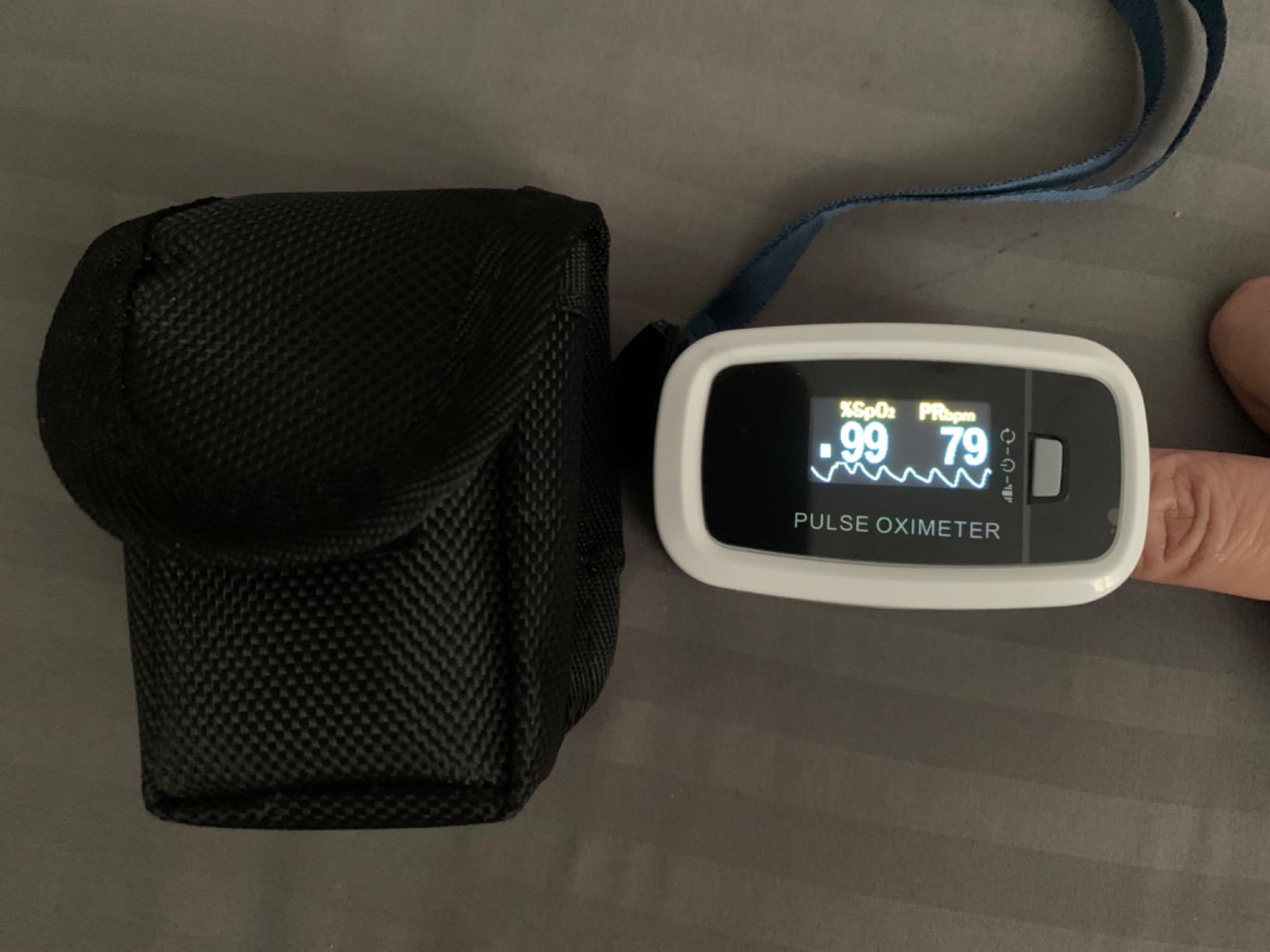 AccuMed CMS-50D1 Fingertip Pulse Oximeter Blood Oxygen Sensor SpO2 for Sports and Aviation. Portable and Lightweight with LED Display, 2 AAA Batteries, Lanyard and Travel Case (White) - Customer Photo 1