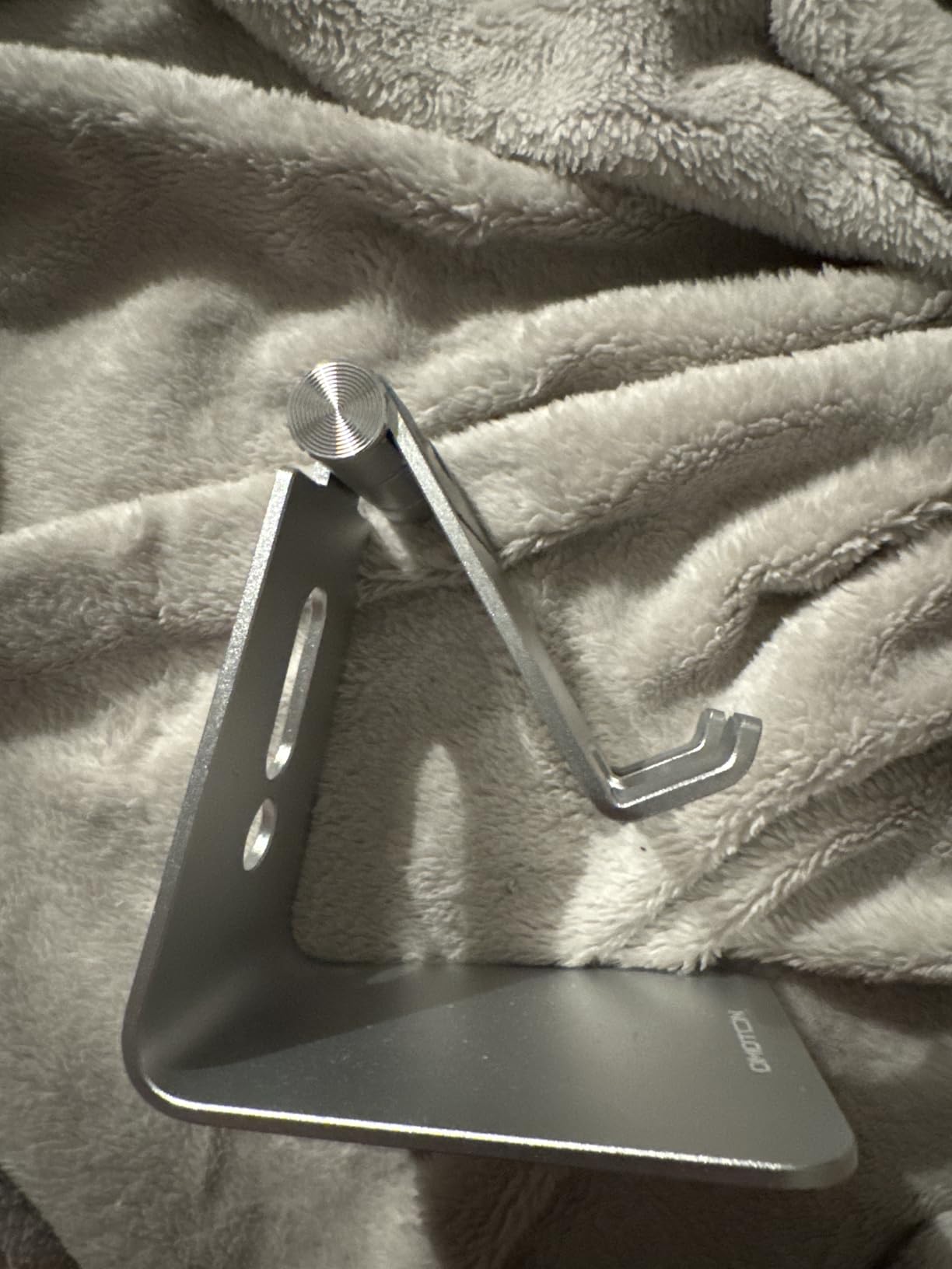 Adjustable Cell Phone Stand, OMOTON Aluminum Desktop Cellphone Stand with Anti-Slip Base and Convenient Charging Port, Fits All Smart Phones, Silver - Customer Photo 1