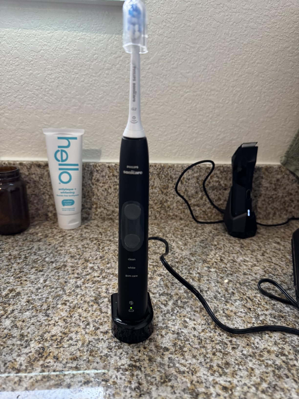 Philips Sonicare ProtectiveClean 5300 Rechargeable Electric Toothbrush, with Pressure Sensor, 3 Cleaning Modes, SmarTimer and QuadPacer, with 2 Bonus Brush Heads, Travel Case, Black, Model HX6423/34 - Customer Photo 1