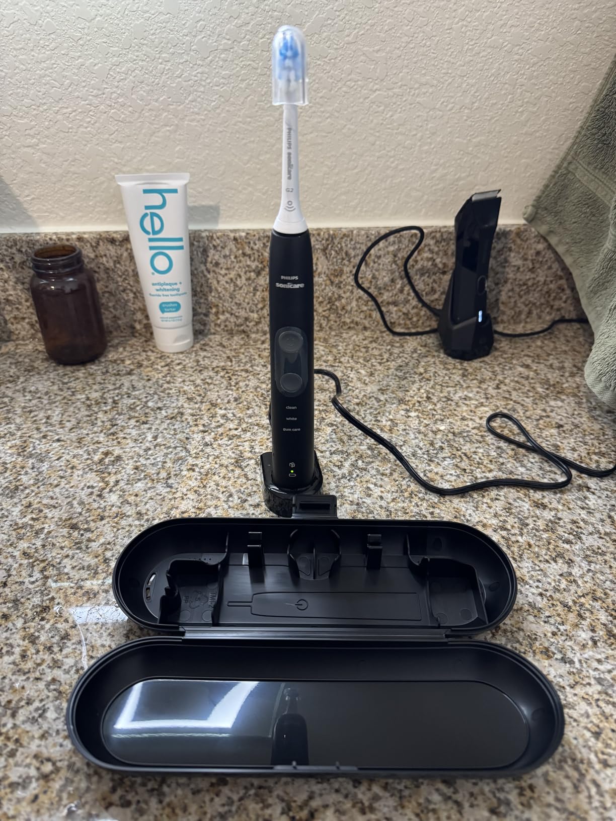 Philips Sonicare ProtectiveClean 5300 Rechargeable Electric Toothbrush, with Pressure Sensor, 3 Cleaning Modes, SmarTimer and QuadPacer, with 2 Bonus Brush Heads, Travel Case, Black, Model HX6423/34 - Customer Photo 2