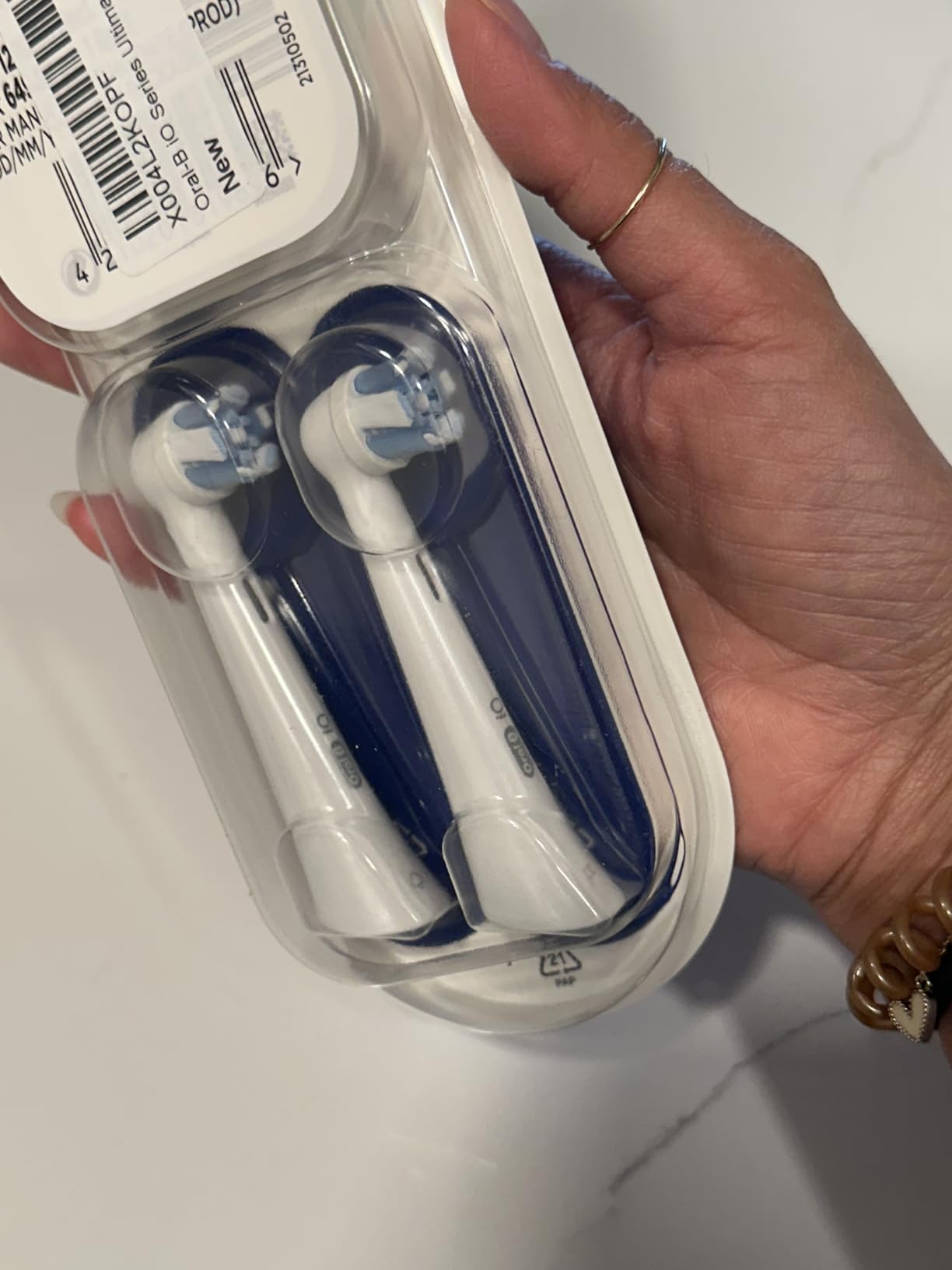 Oral-B iO Series Ultimate Clean Electric Toothbrush Replacement Brush Heads for an Oral-B Electric Toothbrush, 2 Count, White Customer Review Oral-B iO Series Ultimate Clean Electric Toothbrush Replacement Brush Heads for an Oral-B Electric Toothbrush, 2 Count, White - Customer Photo 1