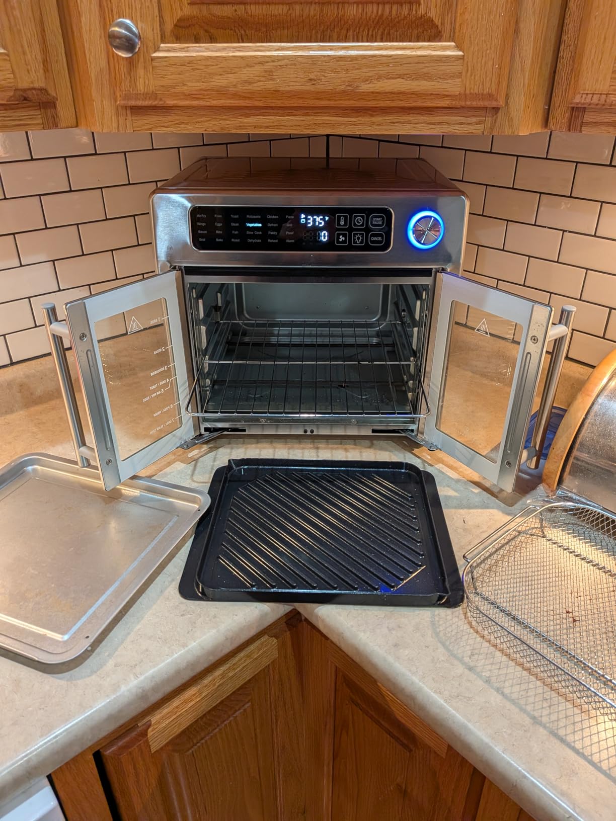 Emeril Lagasse Extra Large French Door Air Fryer Toaster Oven Combo, 24 Cooking Functions and Digital Controls, 7 Accessories Included, Stainless Steel Finish, 26QT Capacity customer photo 1