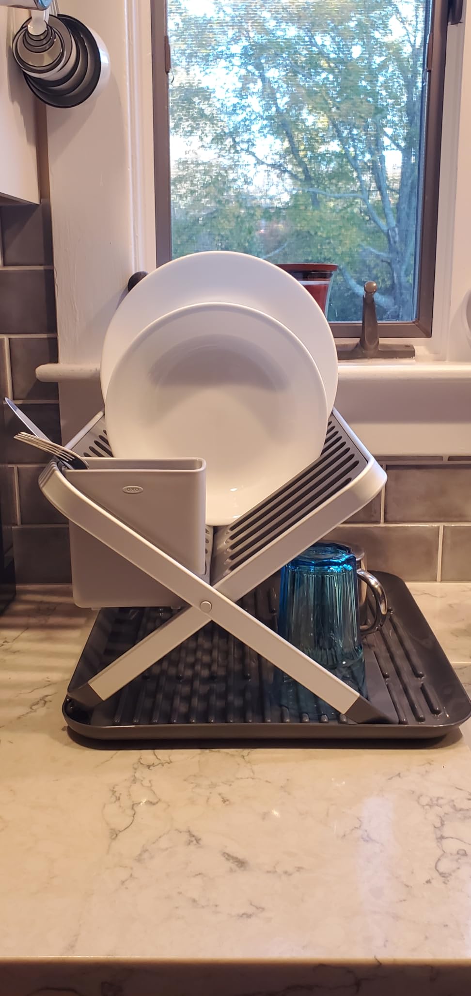 OXO Good Grips Aluminum Fold Flat Dish Drying Rack, 2-Tier, with Drainboard, for Kitchen Counter, Collapsible Customer Review OXO Good Grips Aluminum Fold Flat Dish Drying Rack, 2-Tier, with Drainboard, for Kitchen Counter, Collapsible - Customer Photo 1