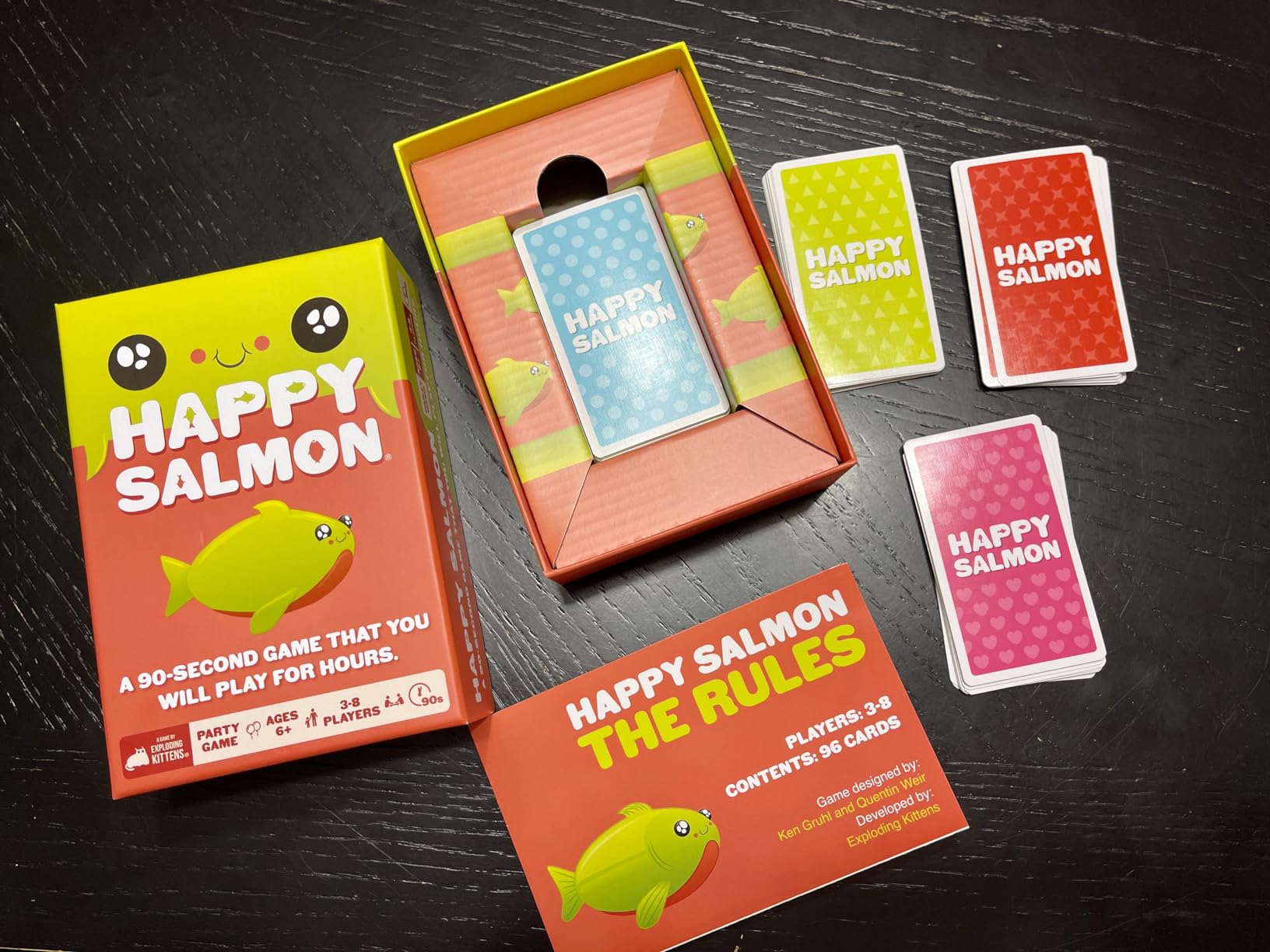 Exploding Kittens Happy Salmon 3-8 Players - Ages 6+ - 90 Second Rounds - Easy to Learn Quick Matching Card Game - Party Game, Family Game Night, Kid and Adult Card Game Customer Review Exploding Kittens Happy Salmon 3-8 Players - Ages 6+ - 90 Second Rounds - Easy to Learn Quick Matching Card Game - Party Game, Family Game Night, Kid and Adult Card Game - Customer Photo 2