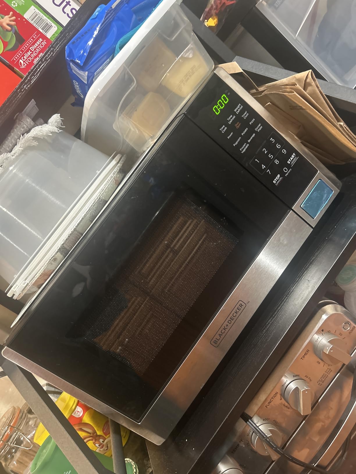 BLACK+DECKER EM044KB19 Over The Range Microwave Oven with One Touch, 1000 Watts, 400 CFM and Auto Cooking, OTR 1.9 Cu.ft customer photo 1