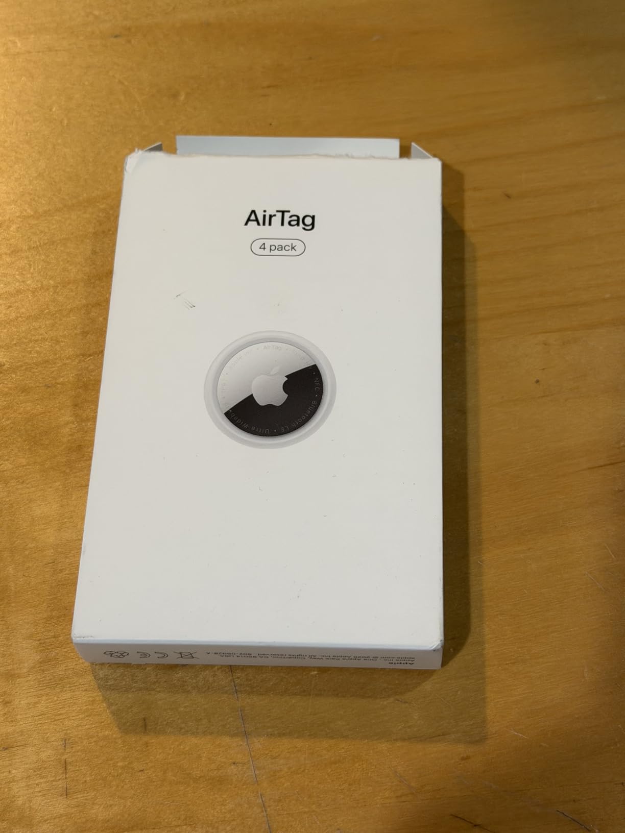 Apple AirTag (1st Generation) - 4 Pack. Keep Track of and Find Your Keys, Wallet, Luggage, Backpack, and More. Simple one-tap Set up with iPhone or iPad, Bluetooth customer photo 2