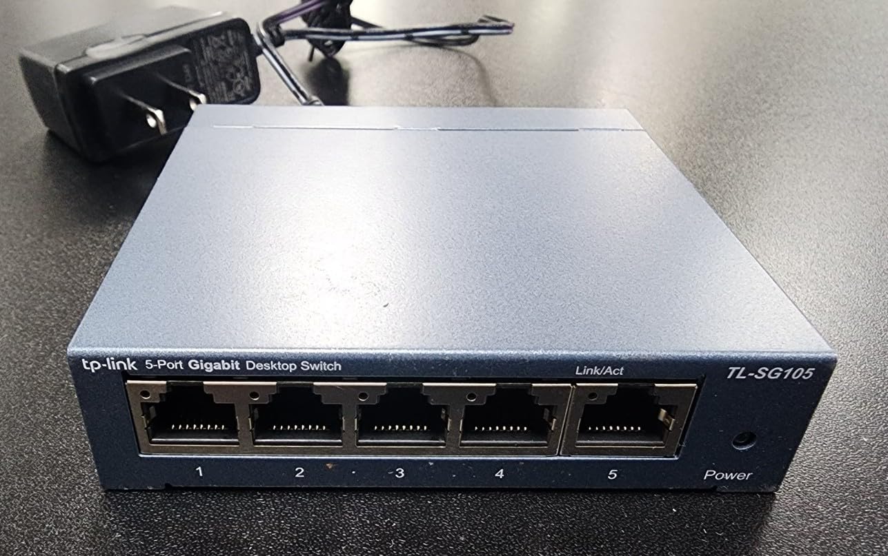TP-Link 24 Port Gigabit Ethernet Switch Desktop/Rackmount Plug & Play Shielded Ports Sturdy Metal Fanless Quiet Traffic Optimization Unmanaged (TL-SG1024S) customer photo 1