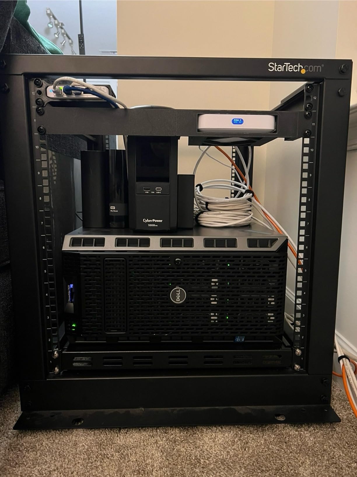 StarTech.com 1U 4-Post Server Rack Shelf, Vented, Adjustable Mounting Depth (28-34.4in/71.1-87.3cm), 150lb (68kg) Capacity customer photo 1