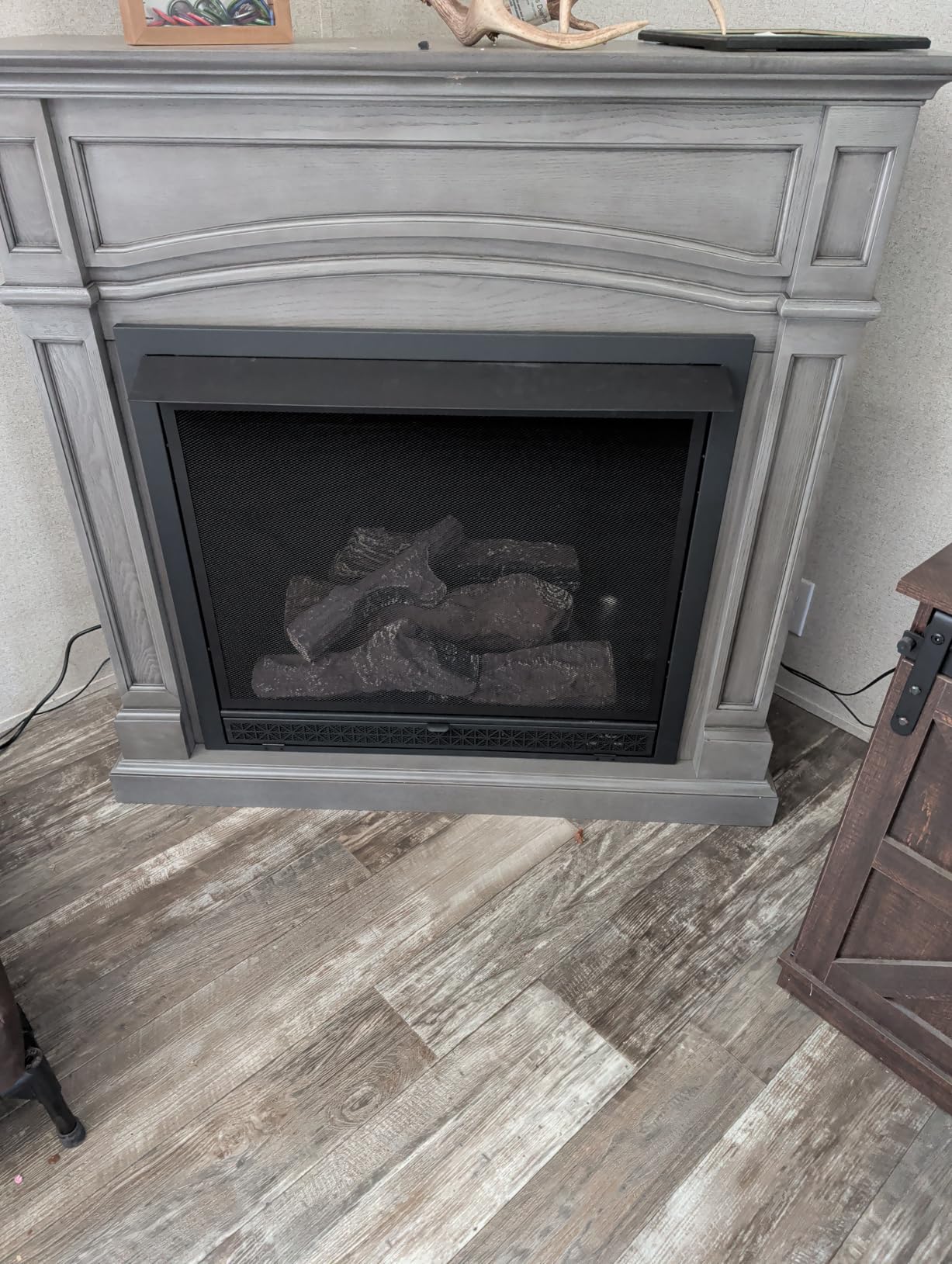 Comfort Glow Dual Fuel Ventless Gas Fireplace with Remote and Mantle The Montreal, Natural Gas or Liquid Propane, 33,000 BTU, Heats Up to 1,200 sq ft - Pewter Oak Finish Gas Fireplace customer photo 1