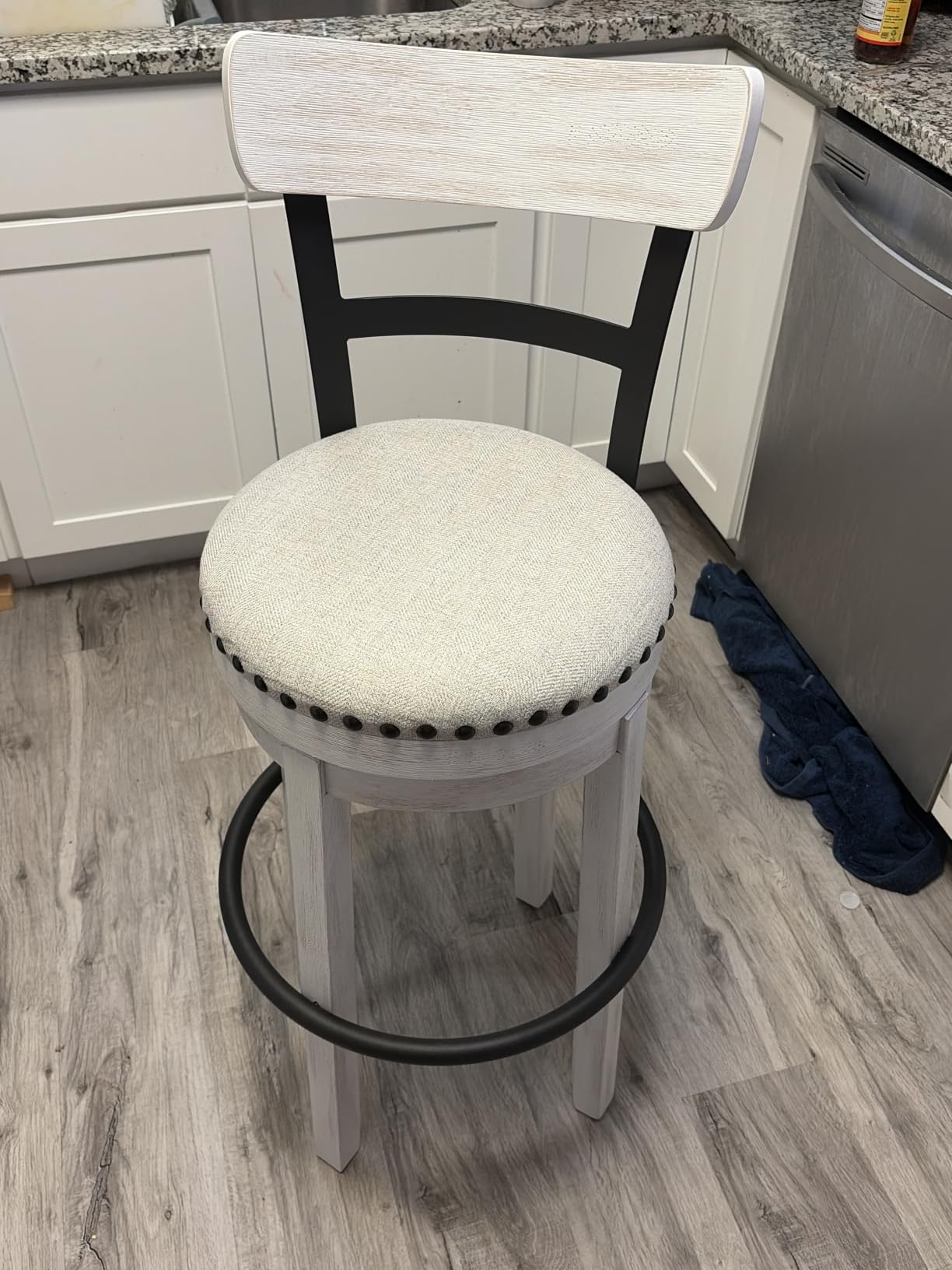 Signature Design by Ashley Pinnadel Bar Stool, Swivel Counter Height Stool Chair With Faux Leather Seat, Wood and Metal Frame for Kitchen Island With Seating, Light Brown customer photo 1