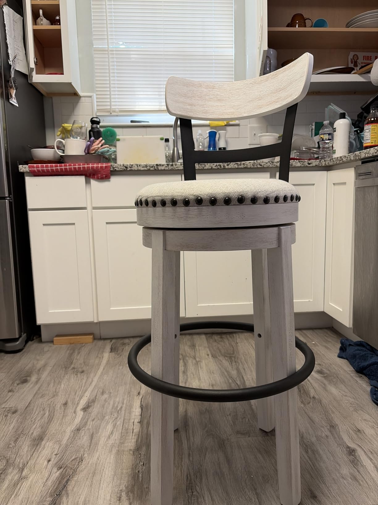 Signature Design by Ashley Pinnadel Bar Stool, Swivel Counter Height Stool Chair With Faux Leather Seat, Wood and Metal Frame for Kitchen Island With Seating, Light Brown customer photo 2