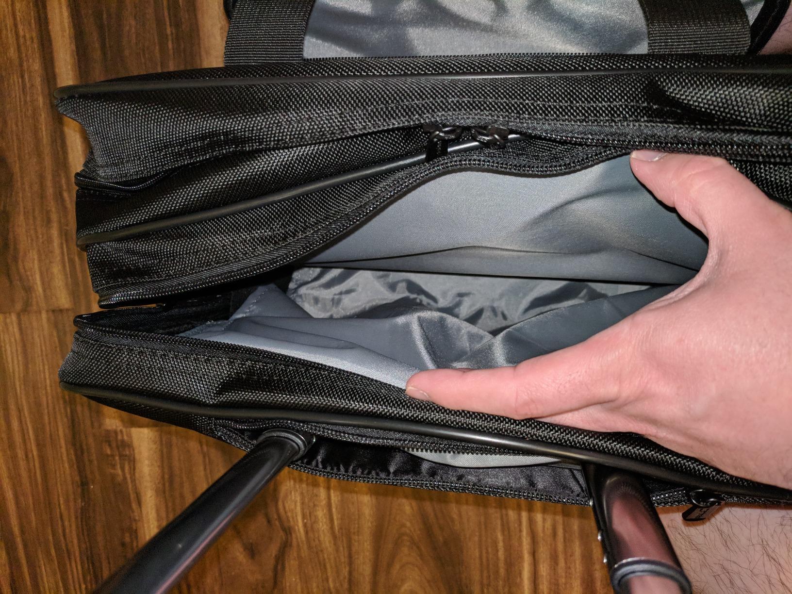 Amazon Basics Rolling Wheeled Laptop Bag, 15.6 in, Black, Sturdy with Compartments and Locking Handle customer photo 1