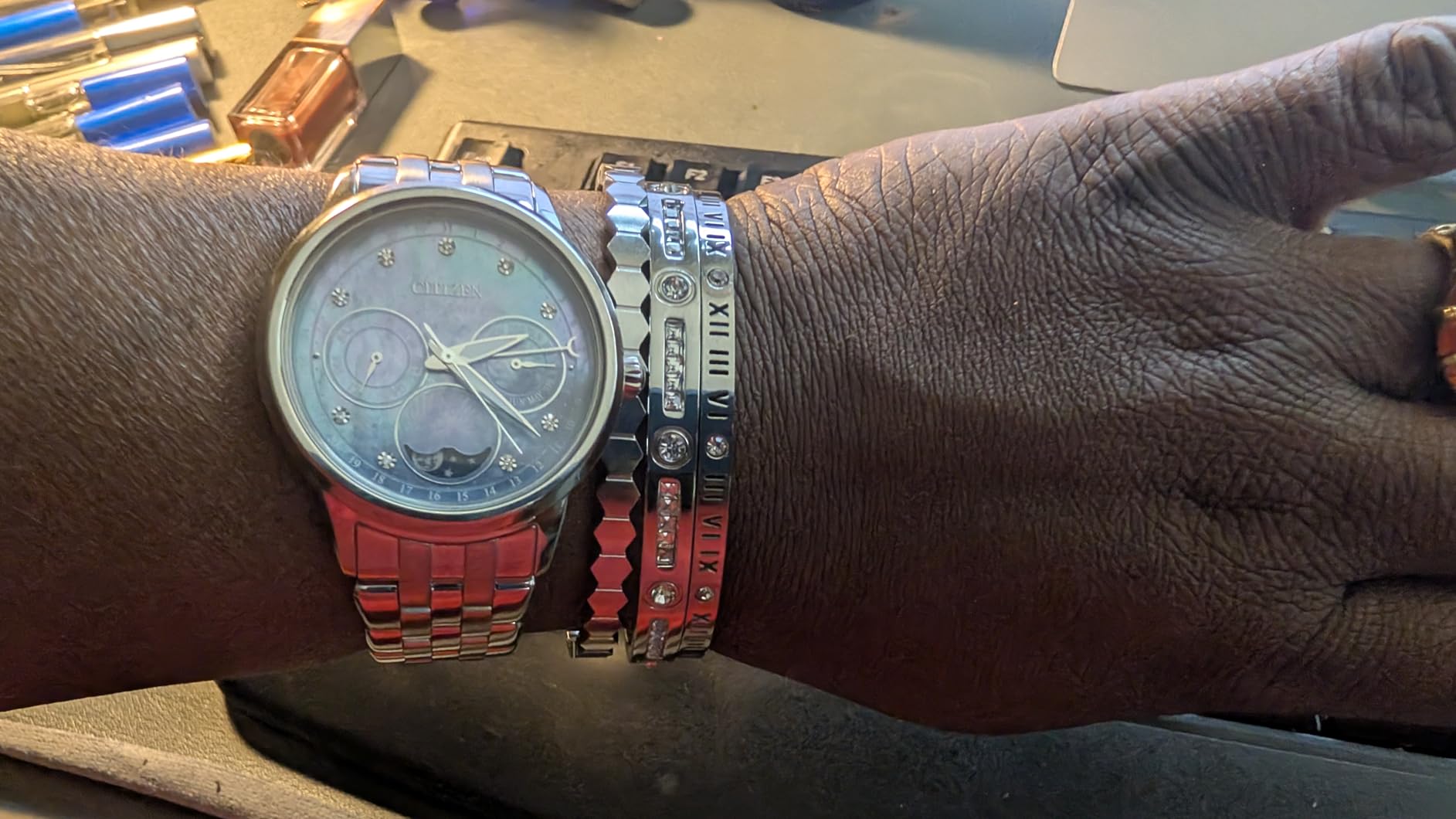 Women's Eco-Drive Calendrier, Moon Phase Diamond Accents Dial, Stainless Case and Bracelet Watch, Month/Day/Date customer photo 1
