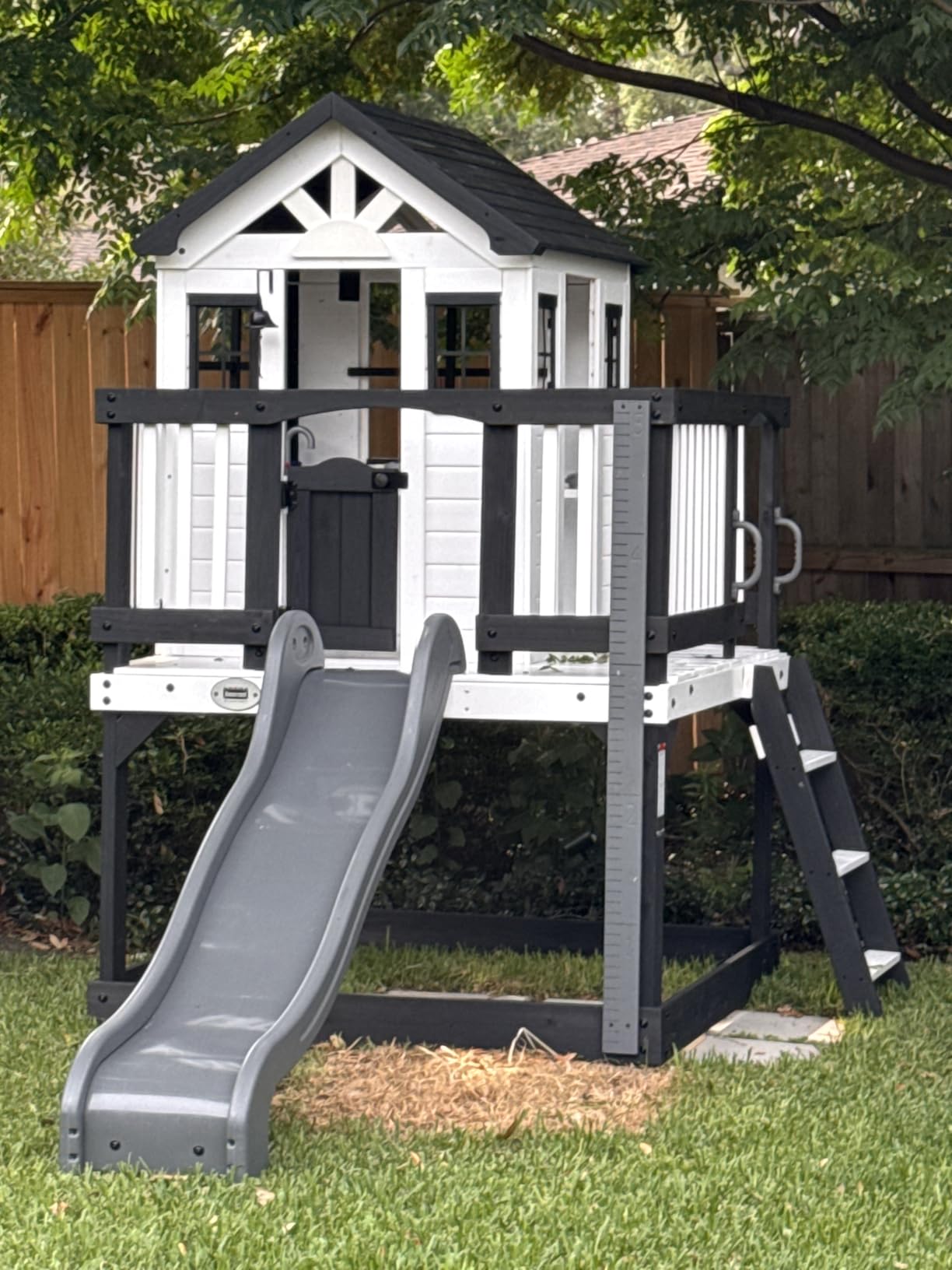Backyard Discovery Beacon Heights Elevated Cedar Wooden Kids Playhouse with Wave Slide, Play Kitchen, Wrap-Around Deck customer photo 1