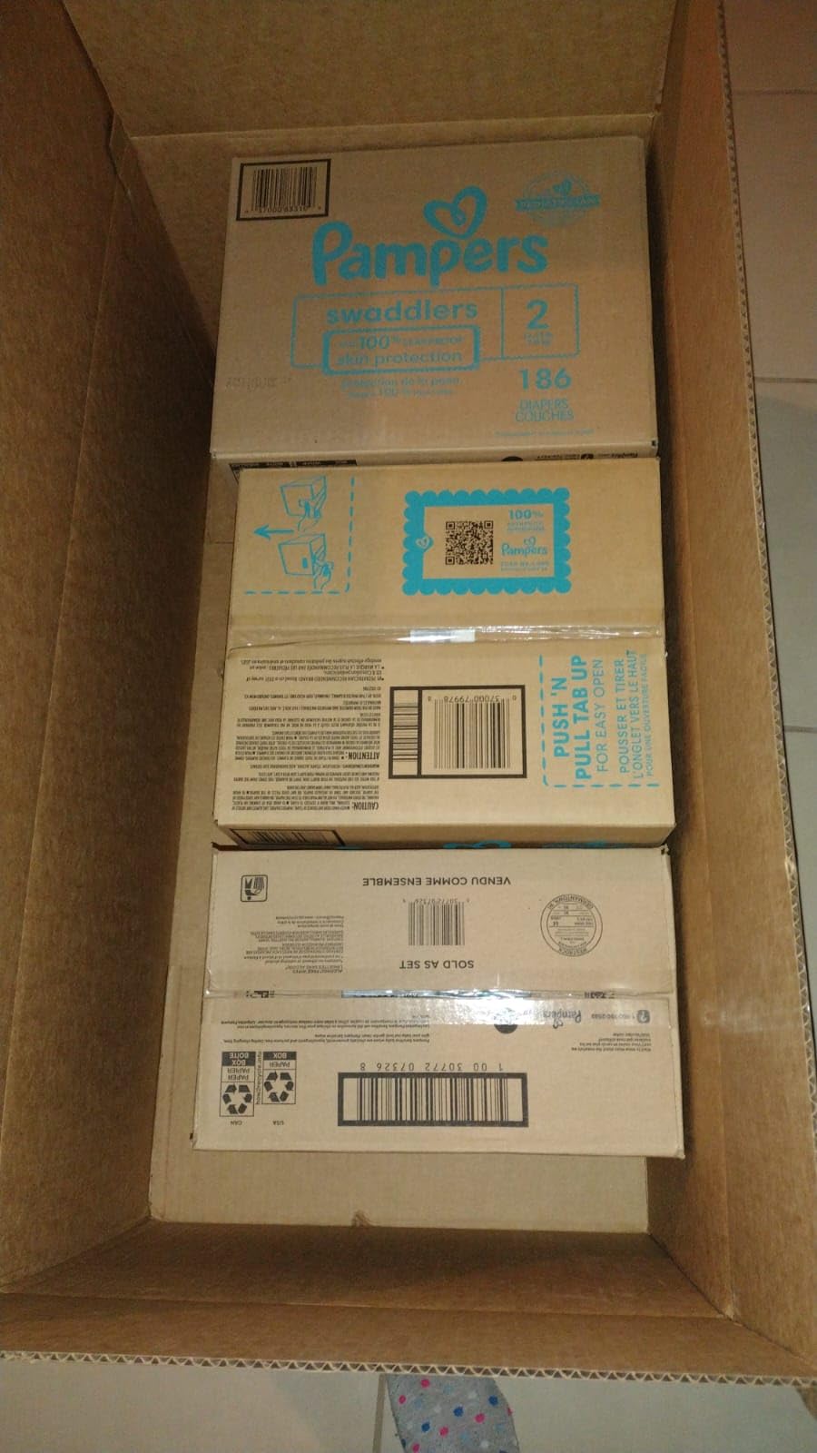 Pampers Baby Diapers and Wipes Starter Kit, Swaddlers Disposable Baby Diapers Sizes 1 (198 Count) & 2 (186 Count) with Sensitive Water Based Baby Wipes 18X Flip Top Packs (1008 Count) customer photo 2