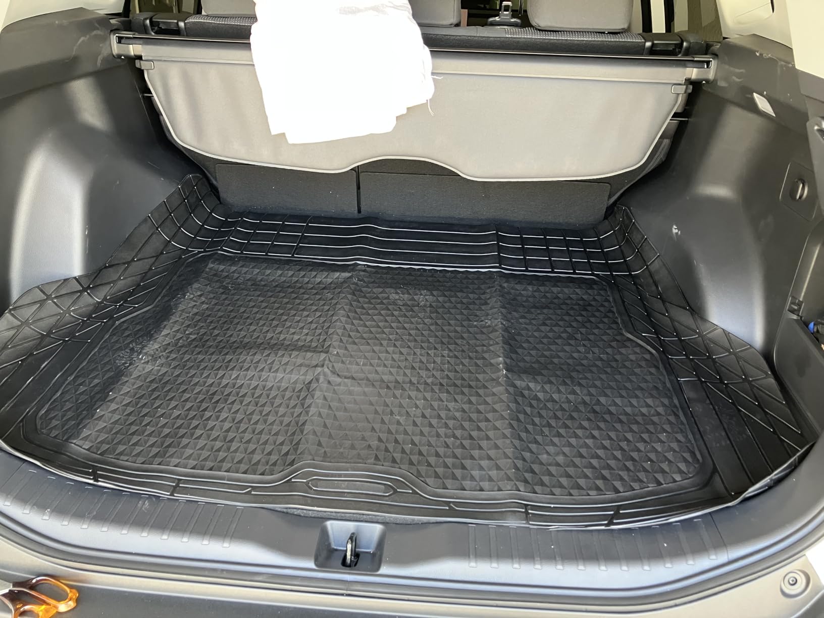 Amazon Basics Cargo Liner Floor Mat, All Weather Trunk Protection, Trimmable to Fit, Black customer photo 1